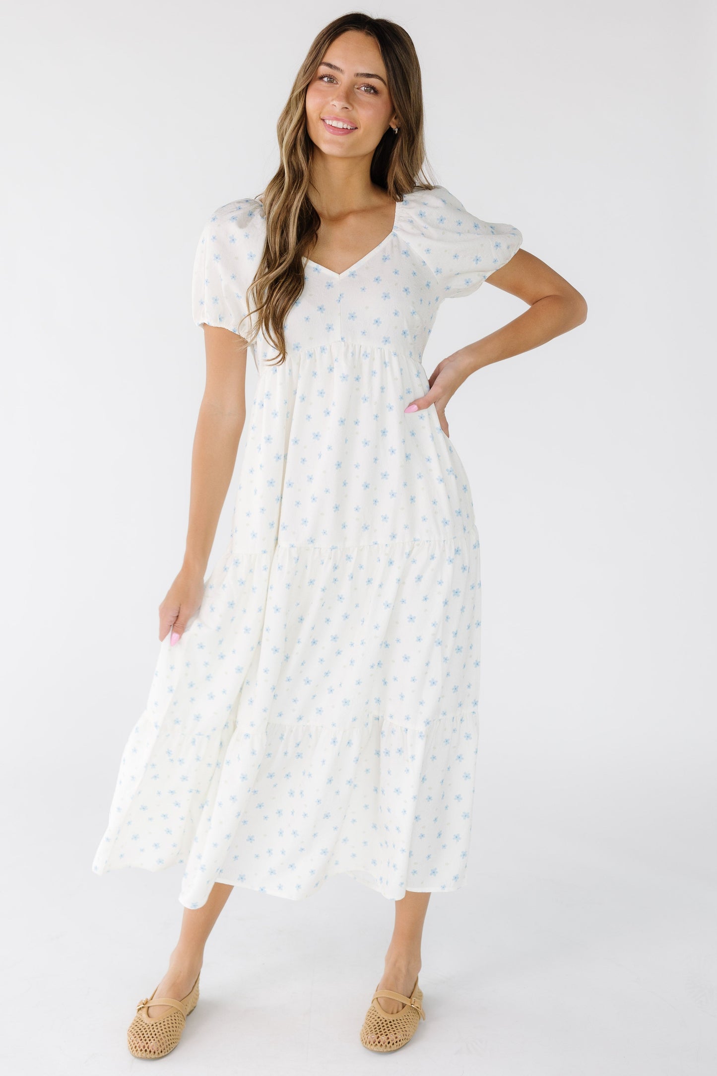 Brass & Roe Amaira Midi Dress in white with blue floral print.