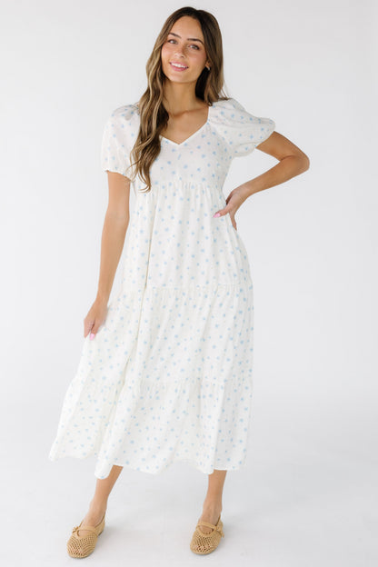 Brass & Roe Amaira Midi Dress in white with blue floral print.