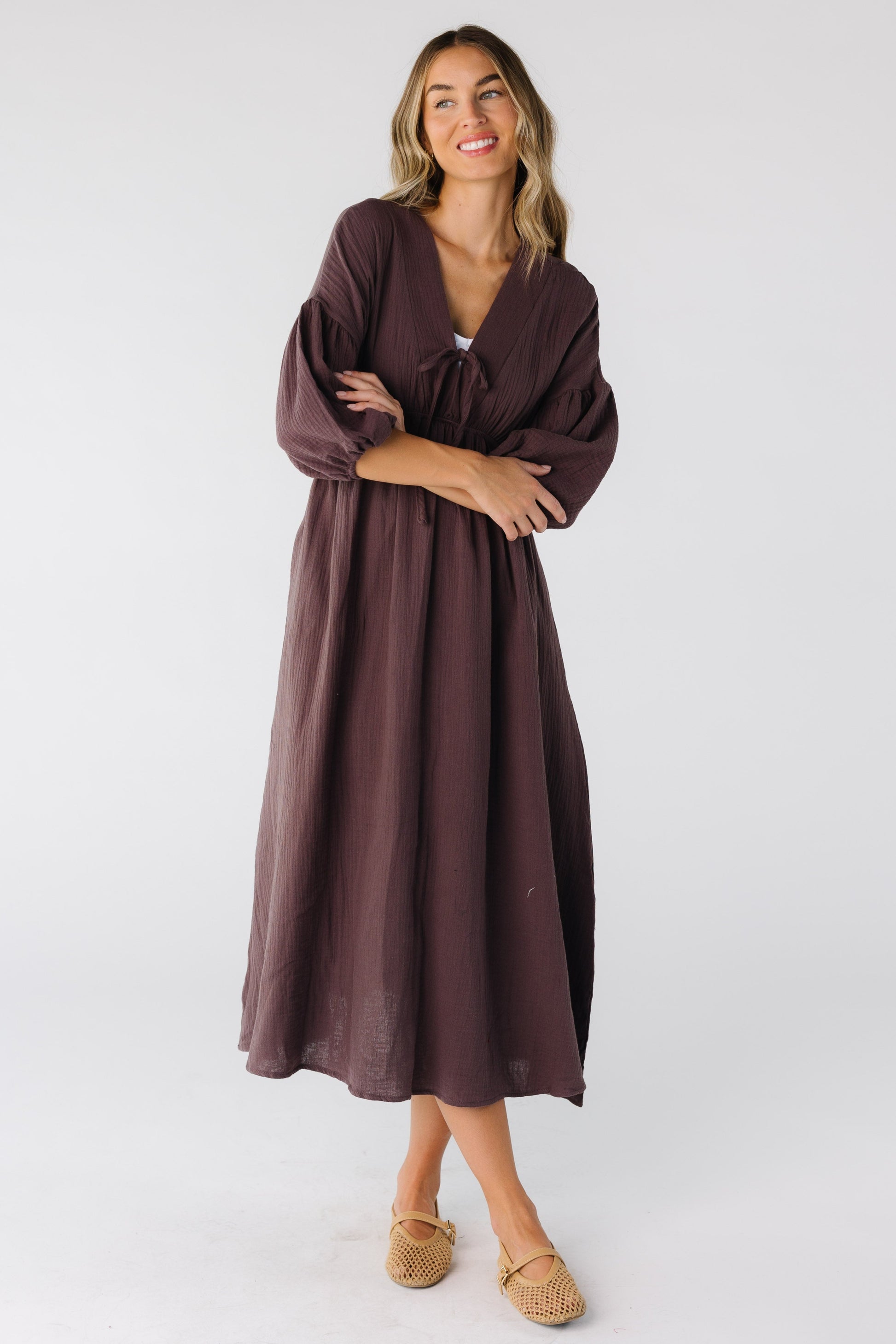 Modest women's brown crepe textured midi dress with V-neckline