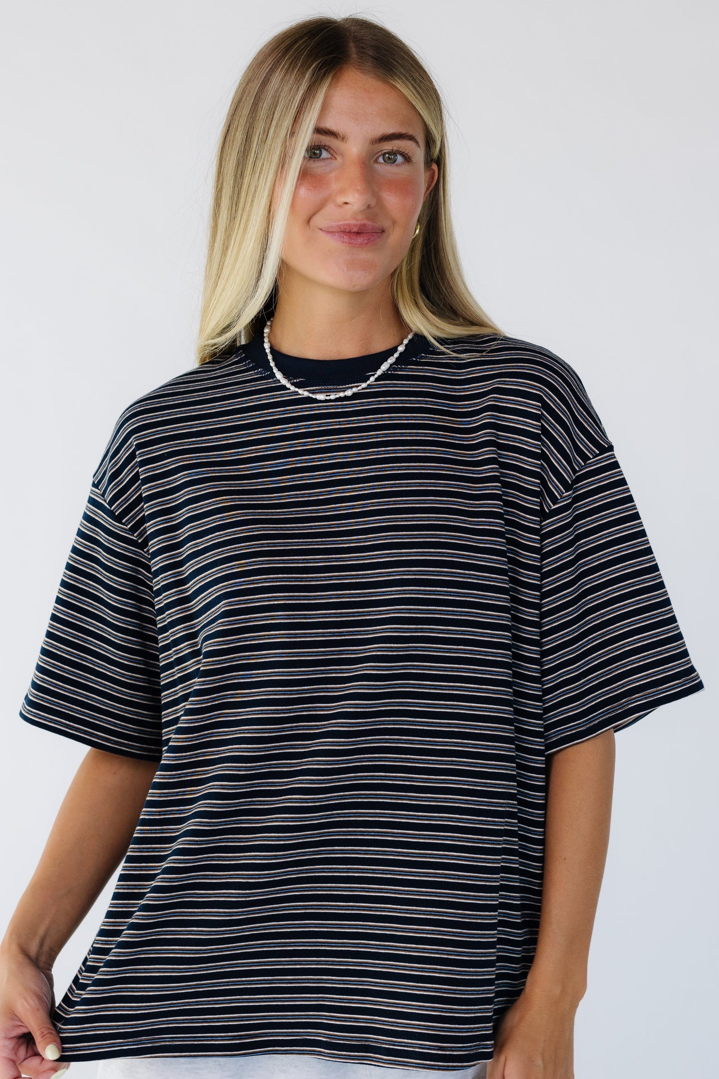 Navy stripe loose fitting tee with short sleeves.