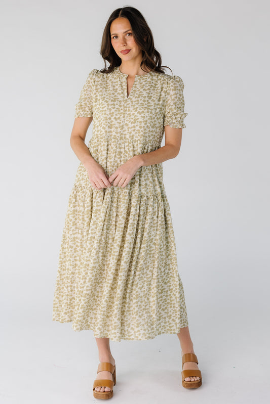 Brass & Roe The Nia Dress in a cream and beige floral print with short puff sleeves.