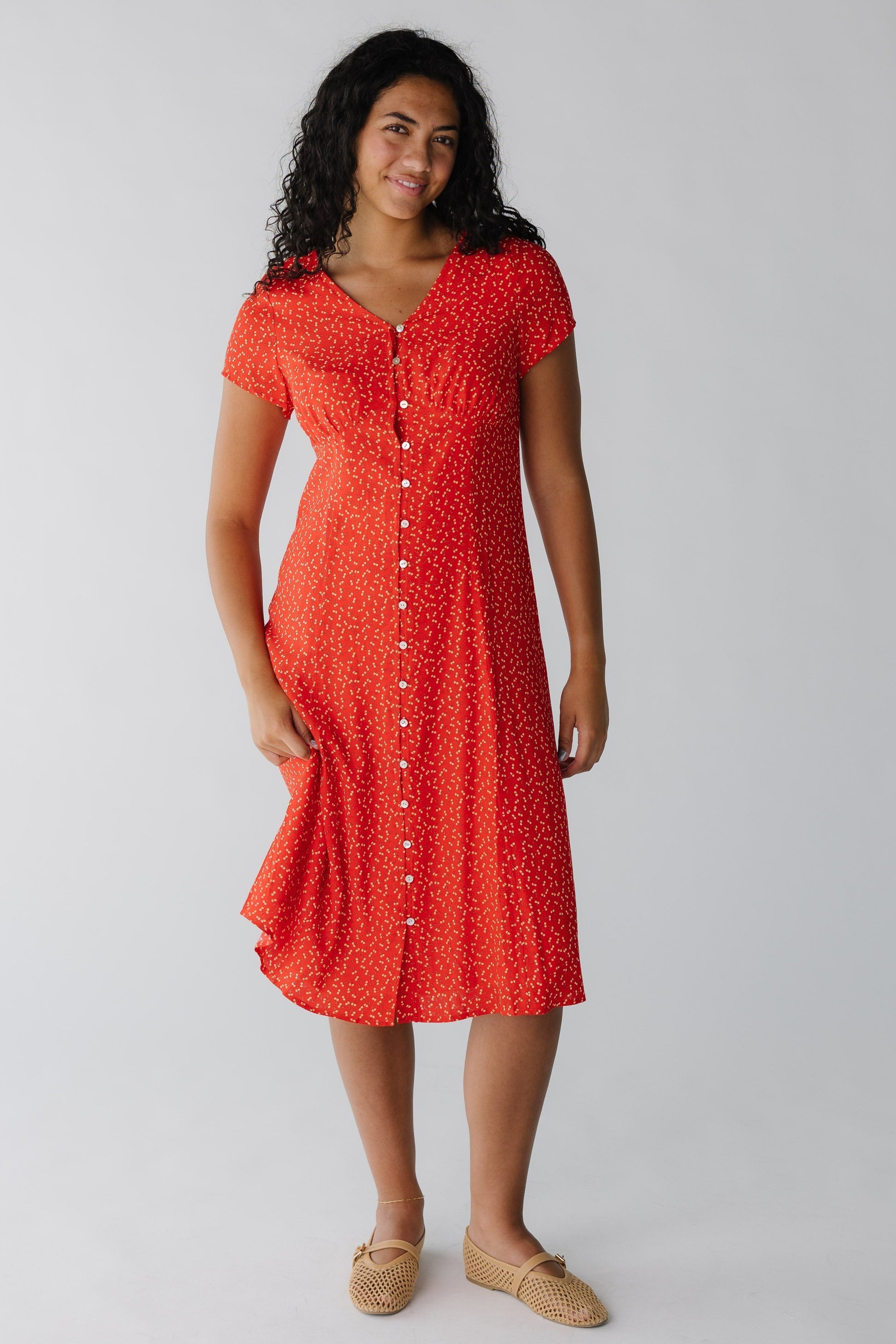 Modest red button down midi with V-neckline and short sleeves