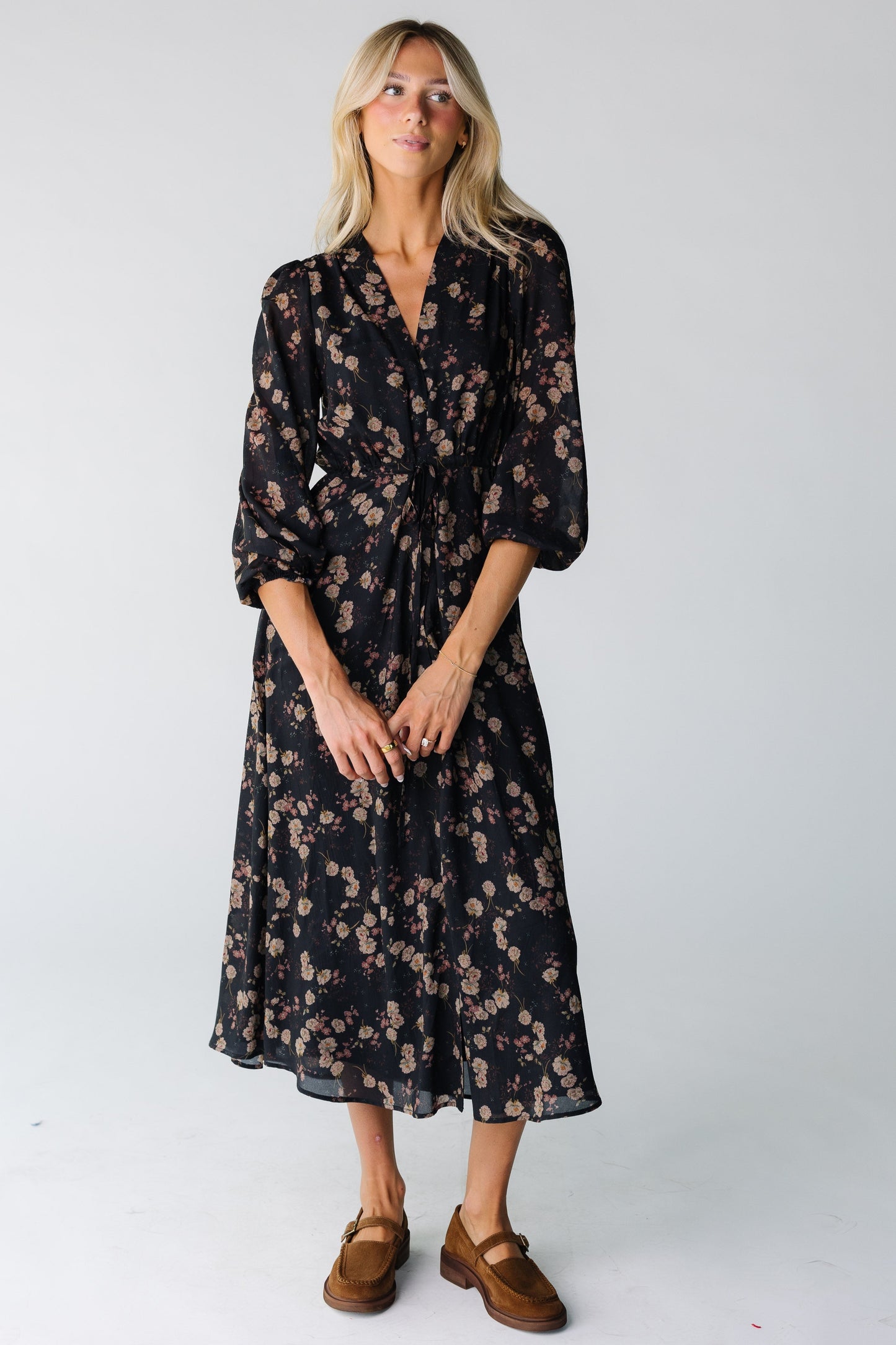 Modest women's midi dress with below elbow length sleeves 