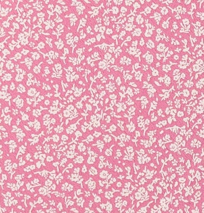 Pink and white floral print fabric swatch.