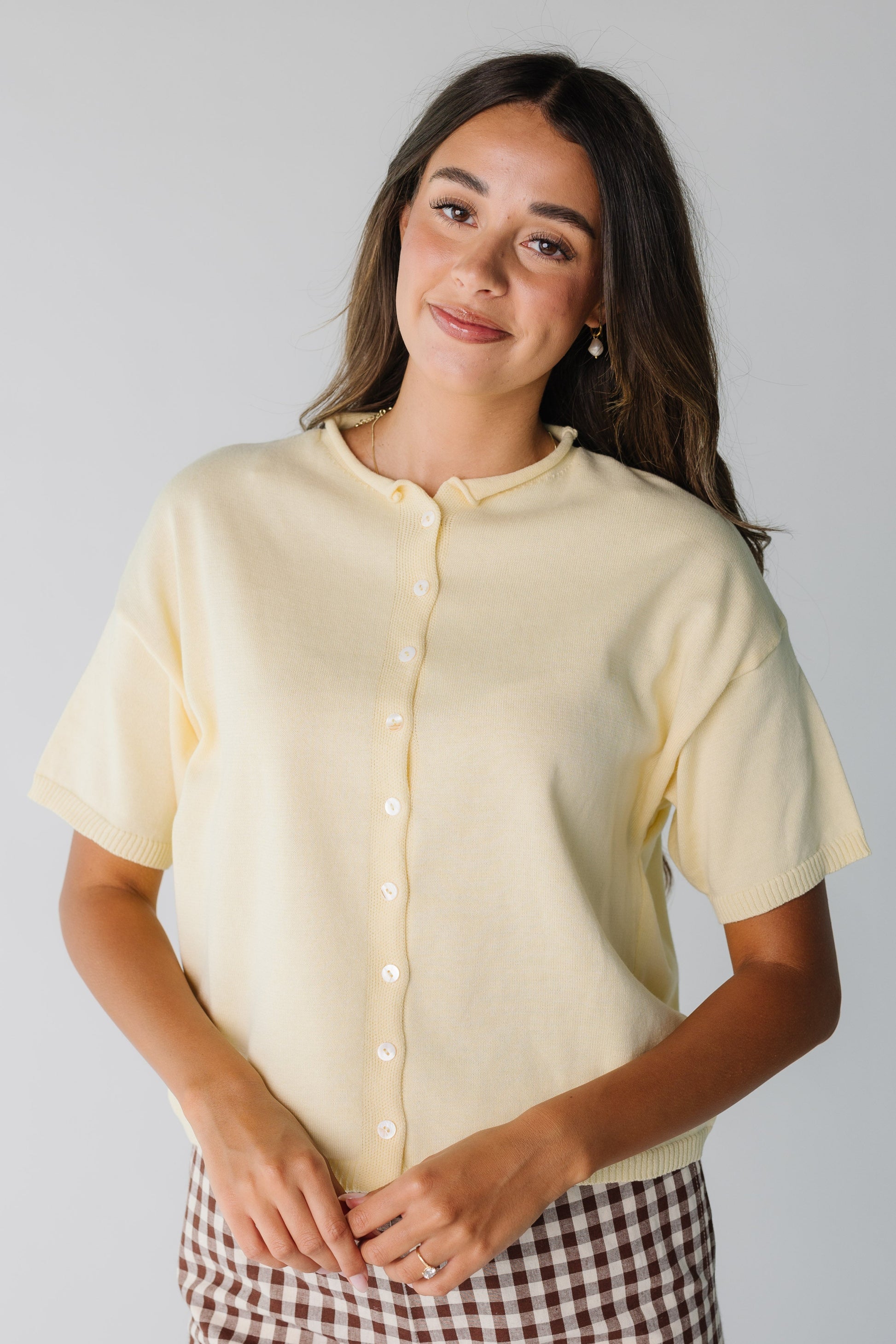 Modest women's yellow short sleeve knit top with round neckline