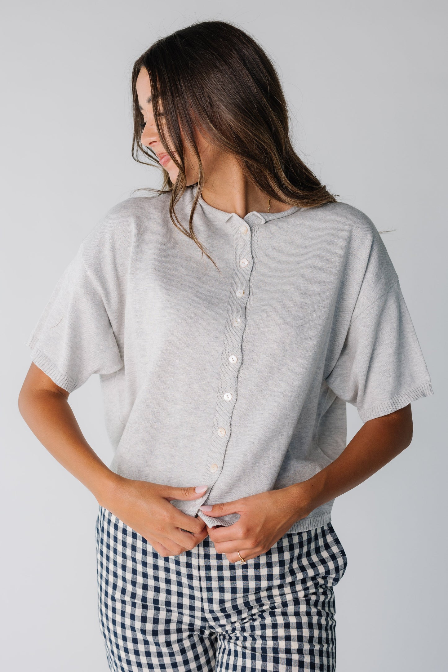 Modest women's knit cardigan with round neckline and short sleeves