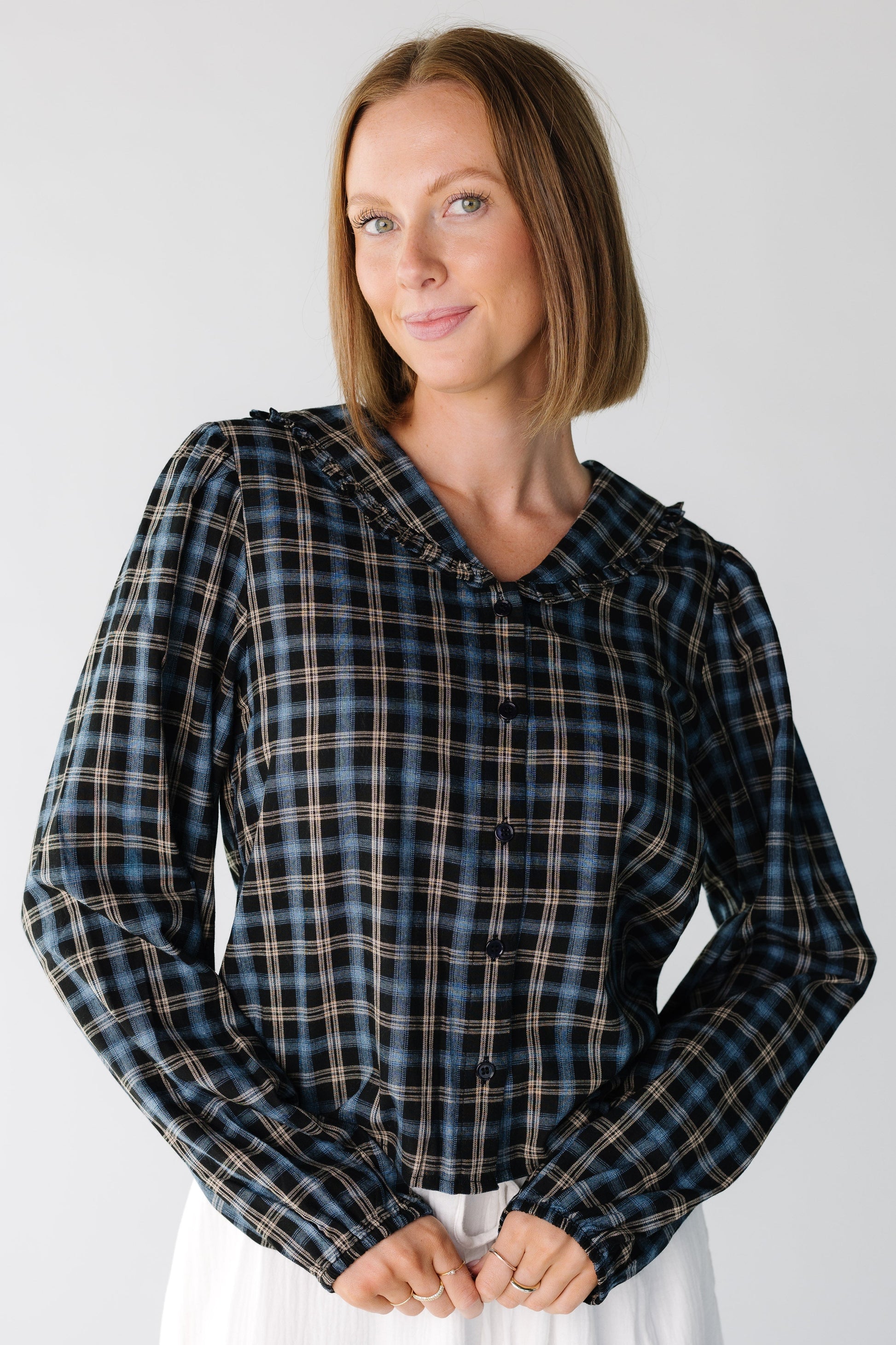 Checkmate Blouse for women and teens in a navy plaid