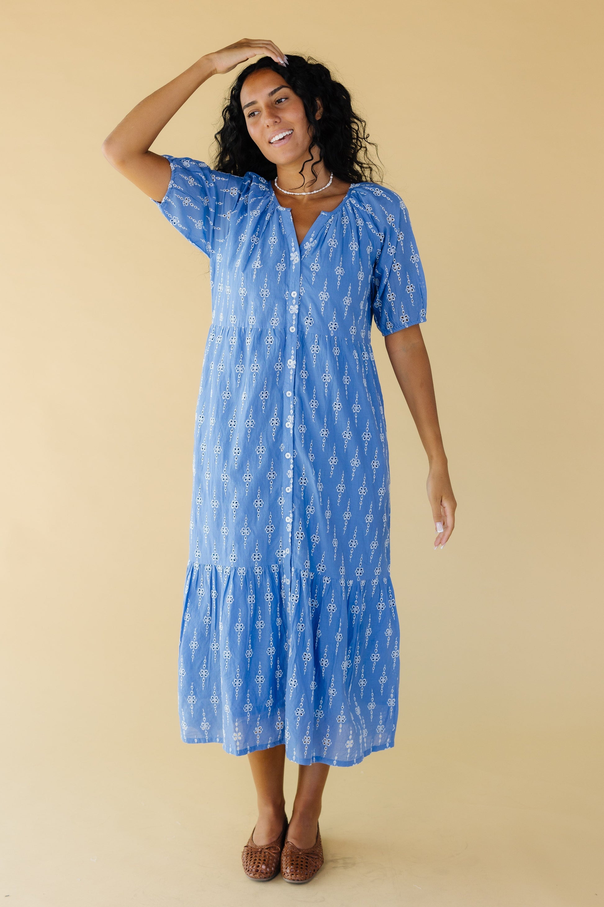 Citrus Cami Button Down Midi Dress in blue with white eyelet & embroidery with a V-neckline, short puff sleeves and a wide bottom ruffle.