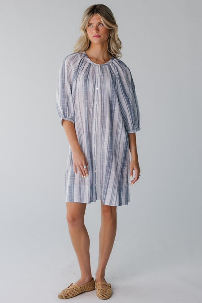 Modest blue and white stipe dress with round neckline and three quarters length sleeves