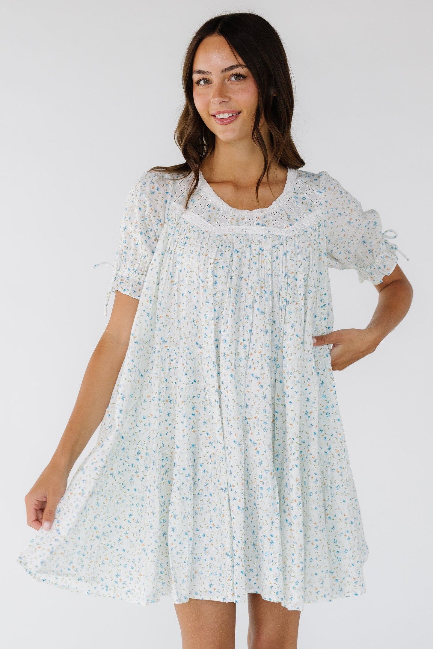 Citrus Spring Take Me Out Knee Dress in a white and blue floral print for women and teen girls.