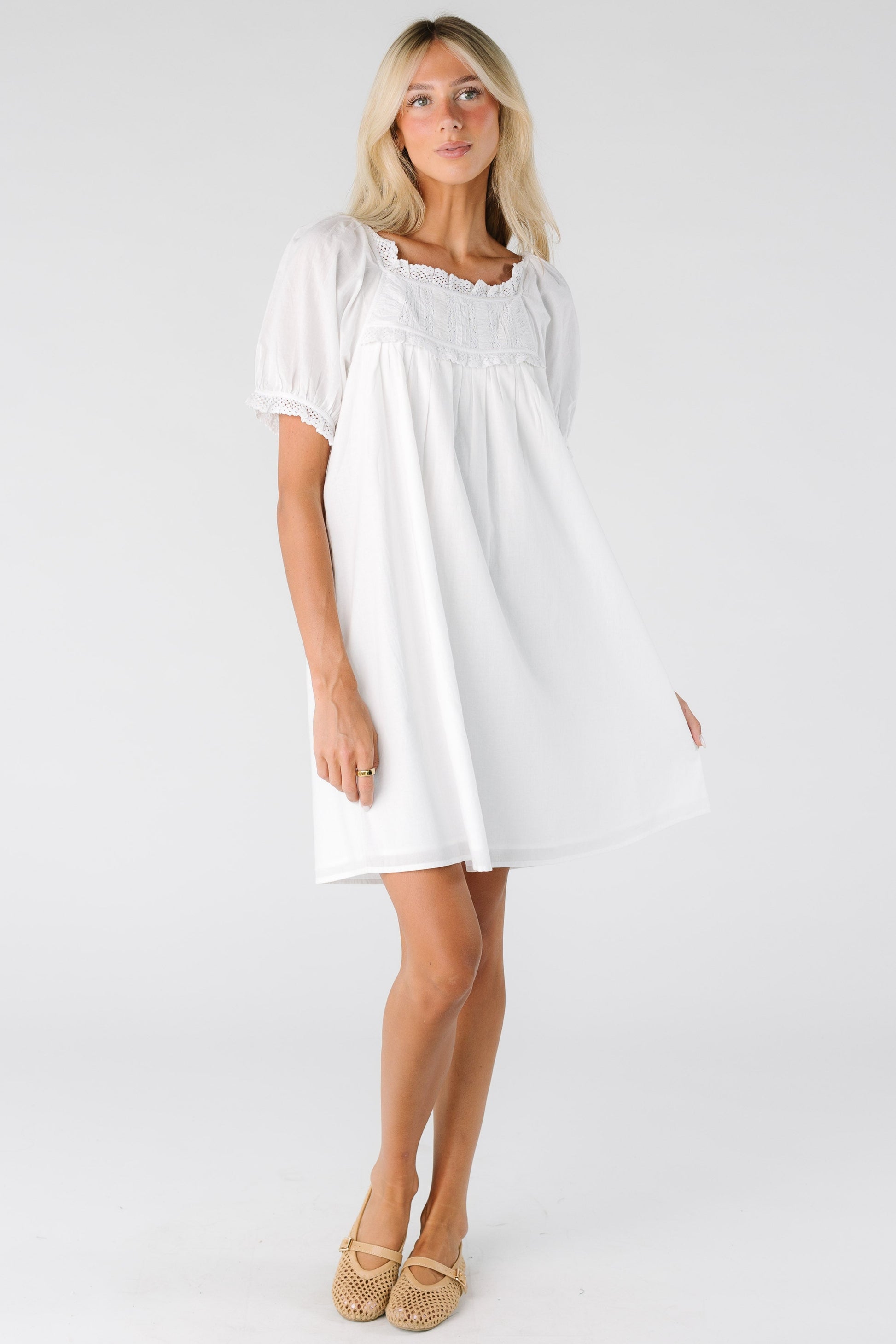 Modest womans' dress with scoop neckline and short sleeves