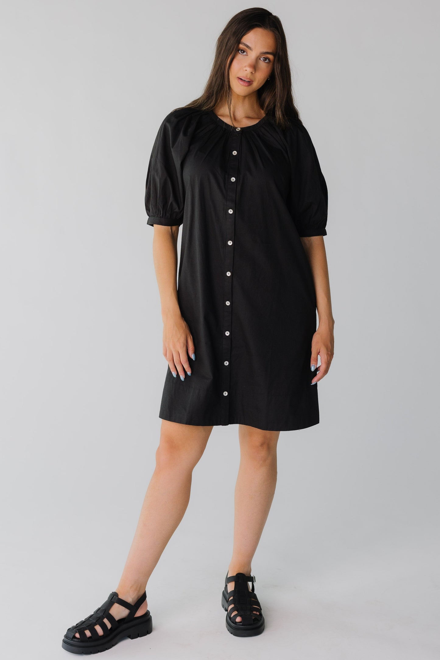Modest black button down dress with elbow length sleeves