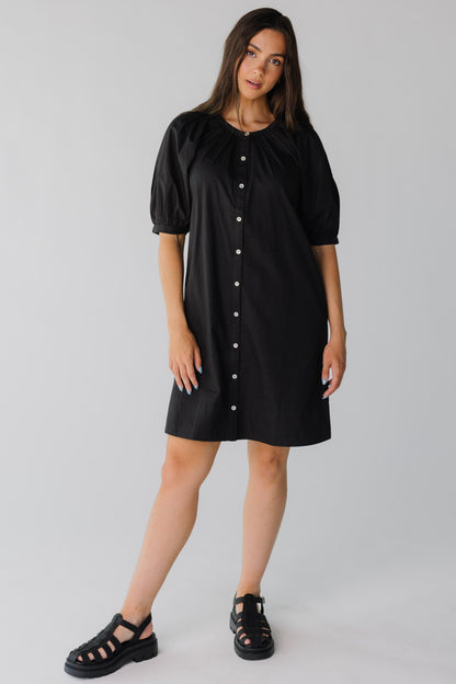 Modest black button down dress with elbow length sleeves