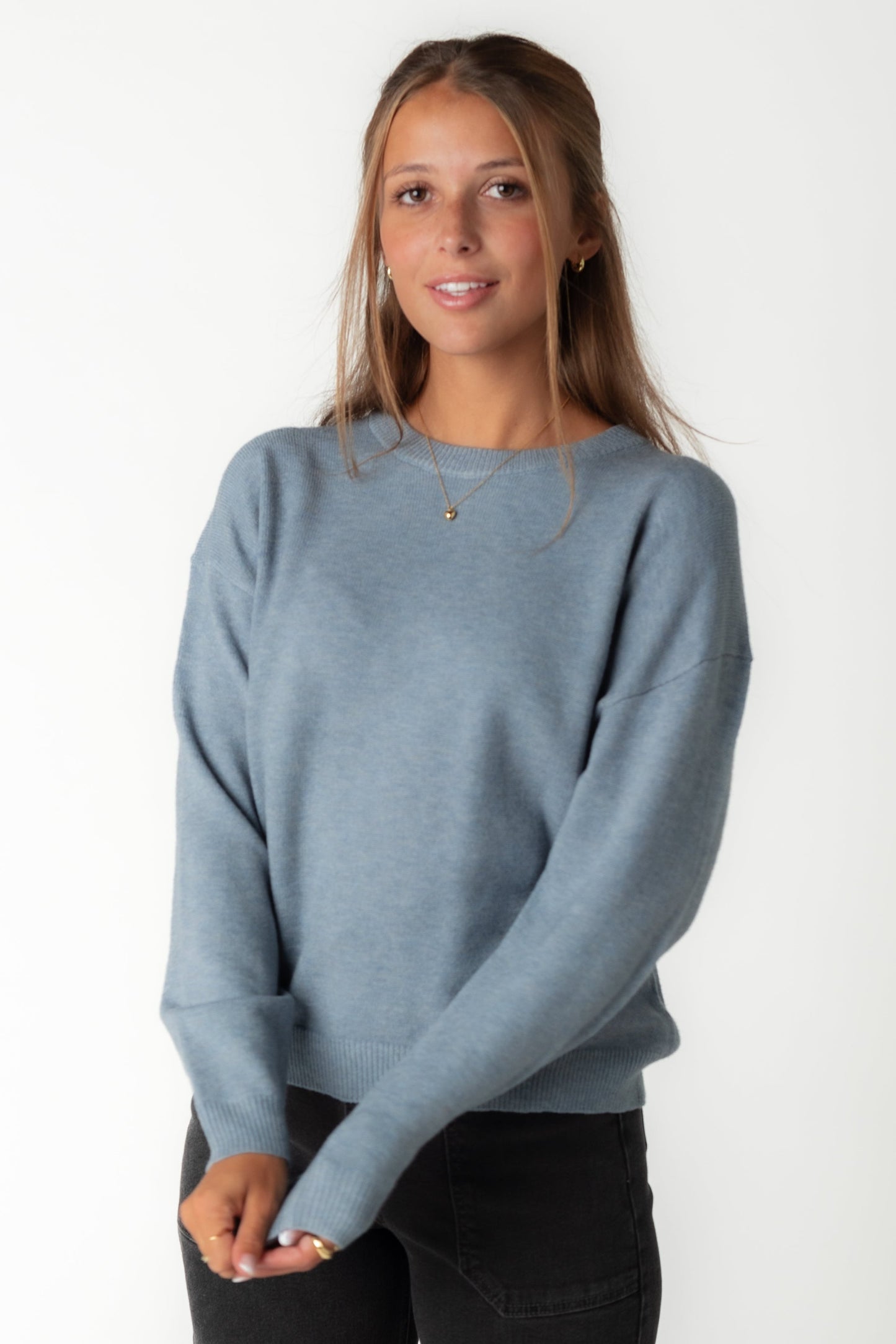 Modest blue sweatshirt with drop shoulders and long sleeves with crew neckline