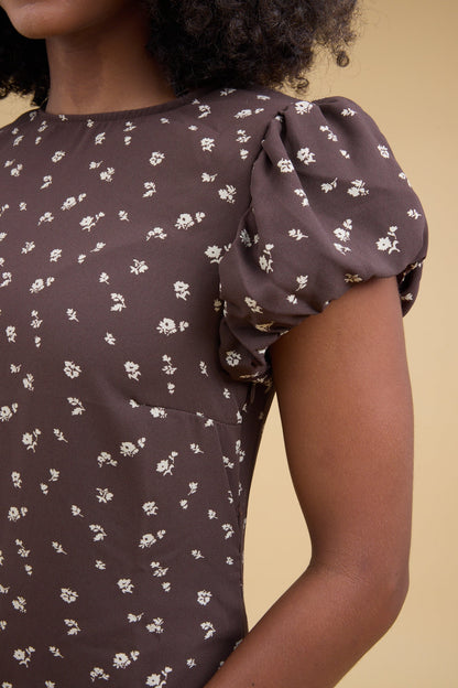 Close fitting brown floral  dress wtih gathered cap sleeves.