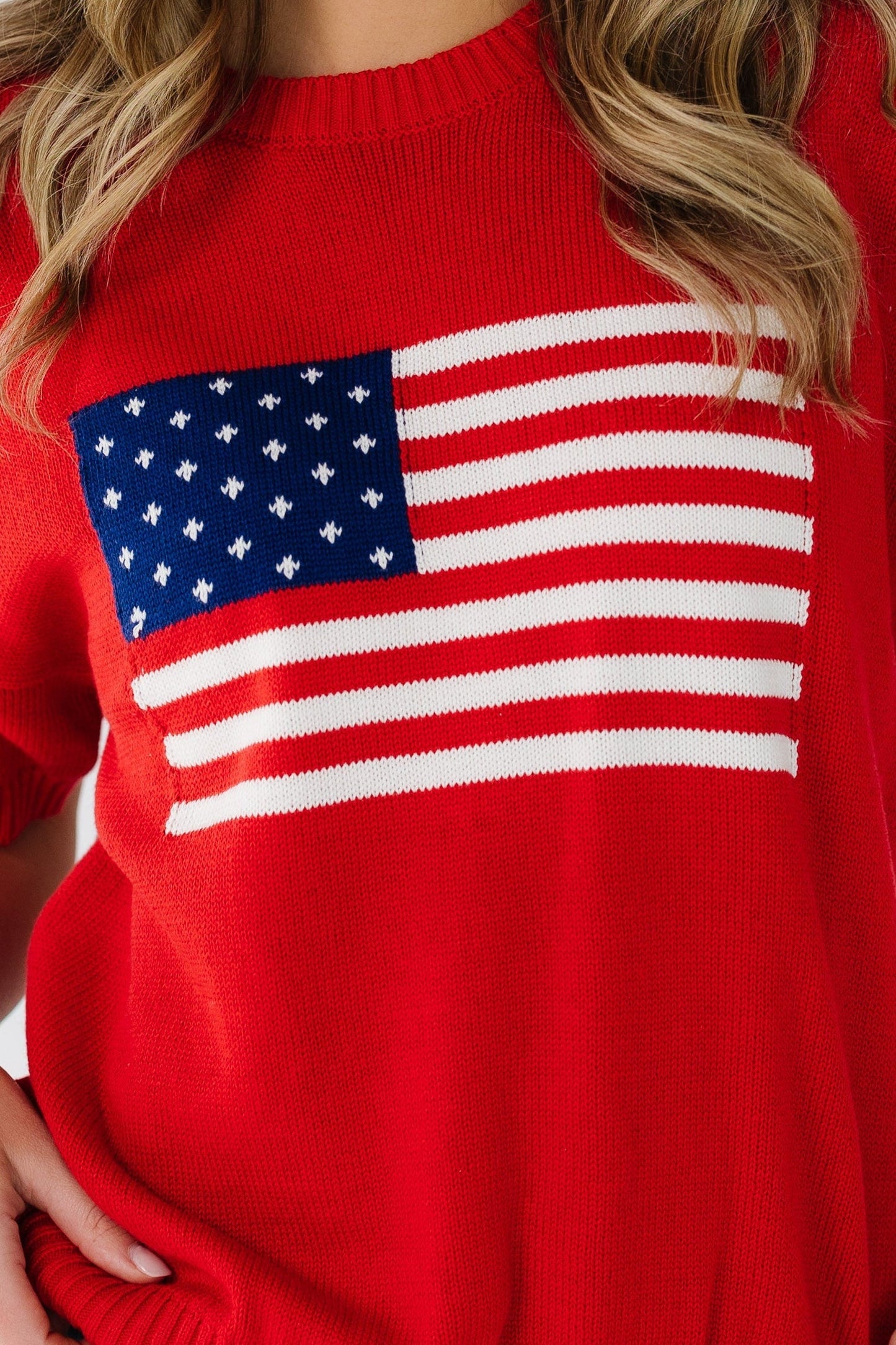 Flag Lite Knit Top in red for women and teenage girls.