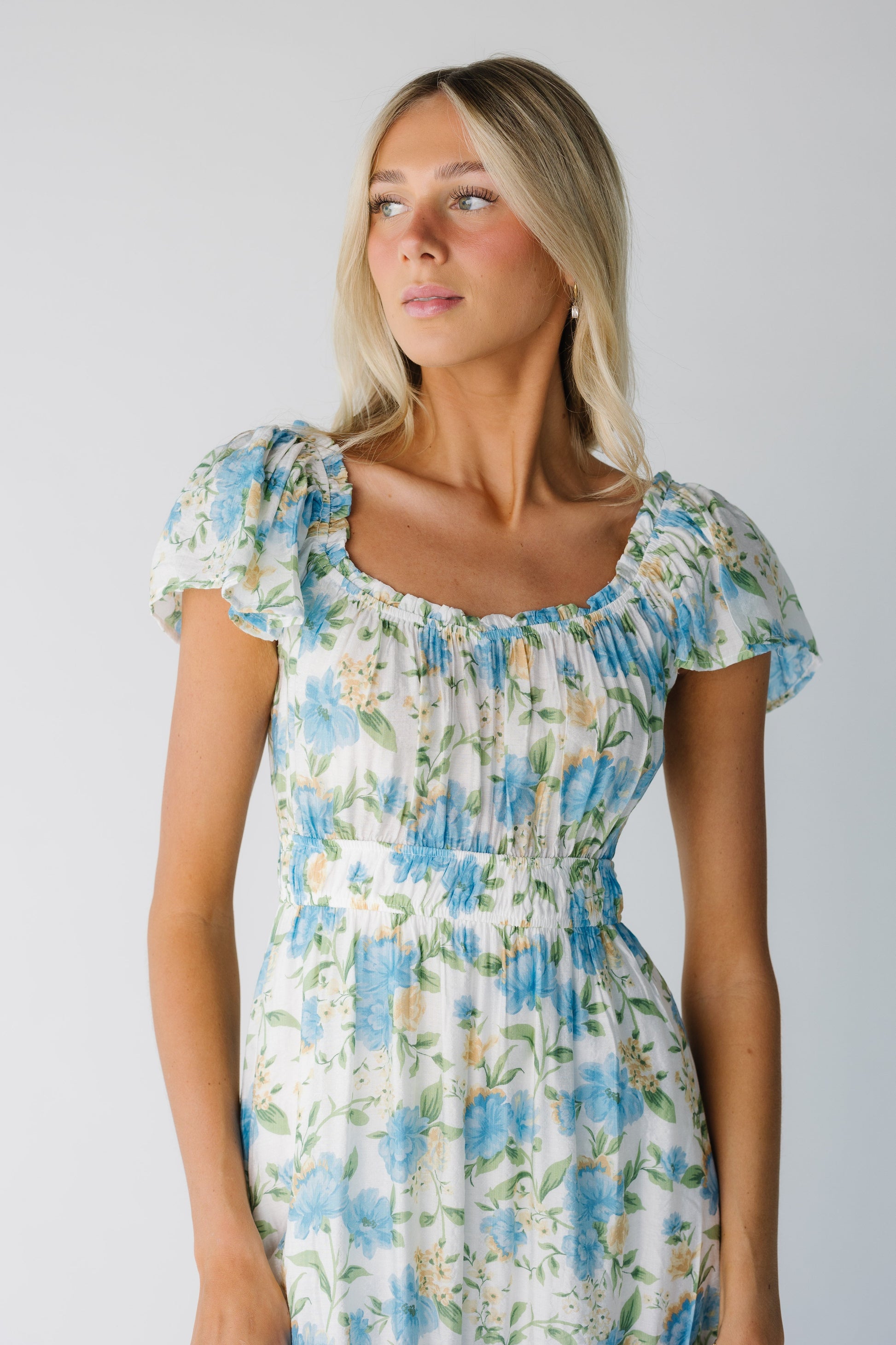 Close view of blue floral square neck midi with wide elastic waist