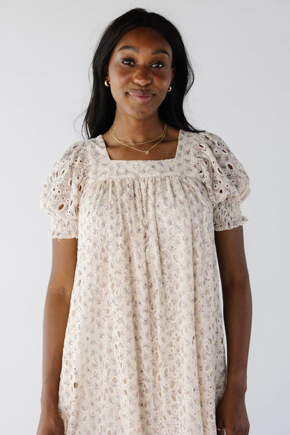 Close view of square neck eyelet dress