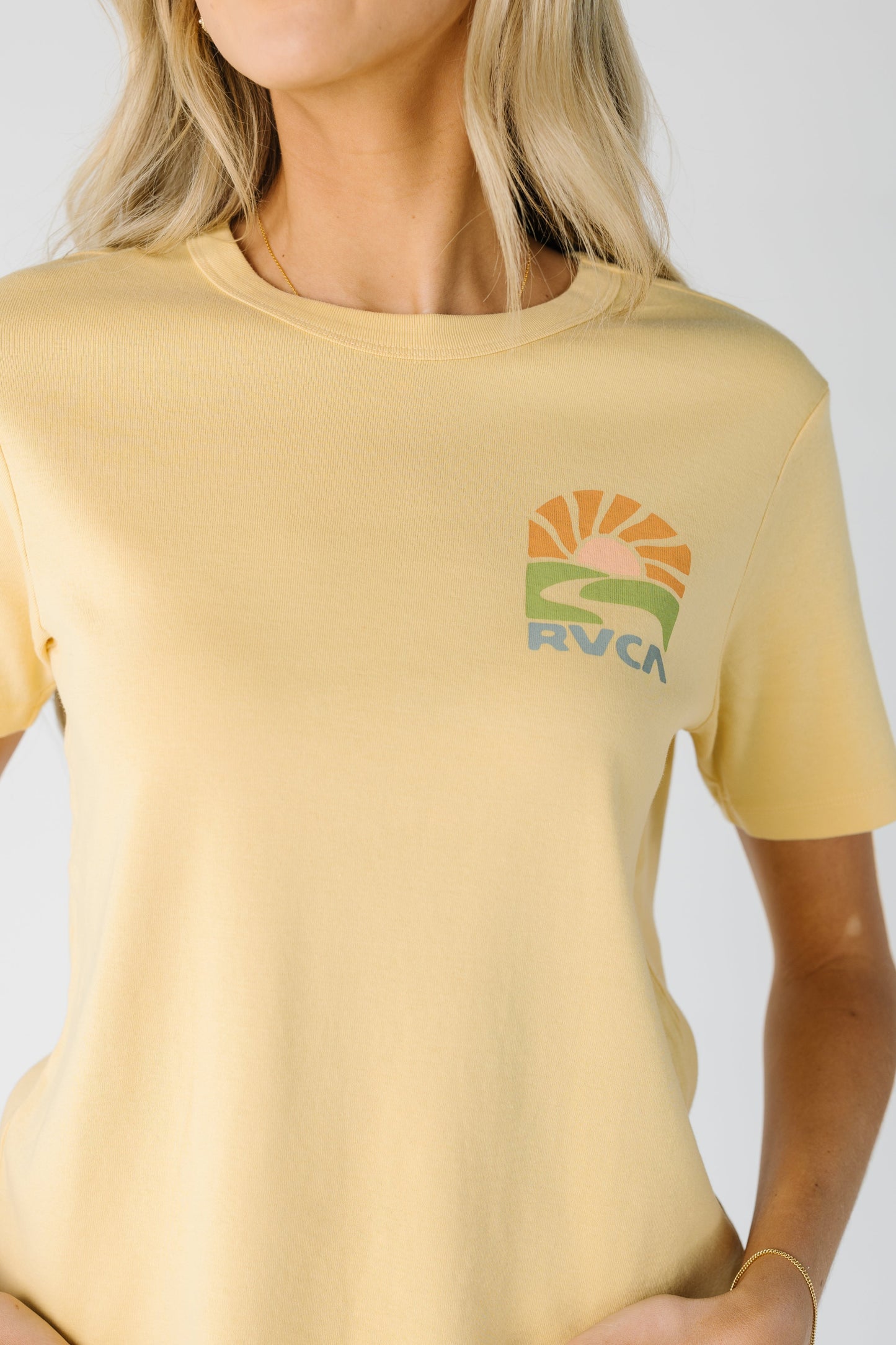 Close view of yellow RVCA Daily Tee