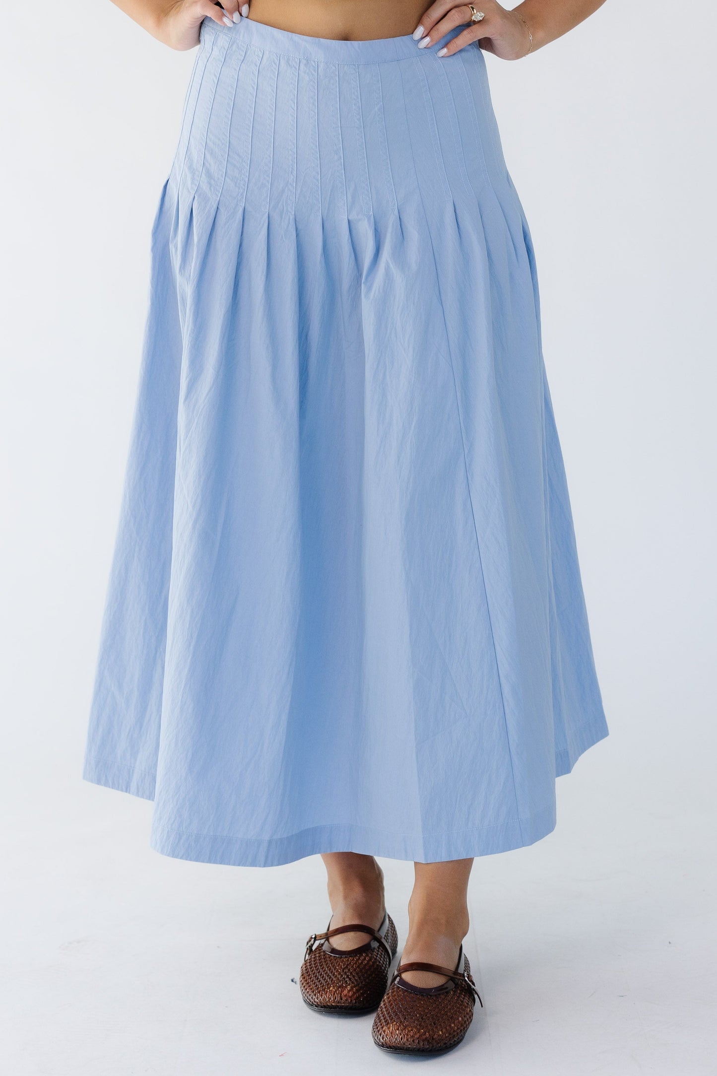 Drop Waist Pleated Midi Skirt in blue for women and teen girls.