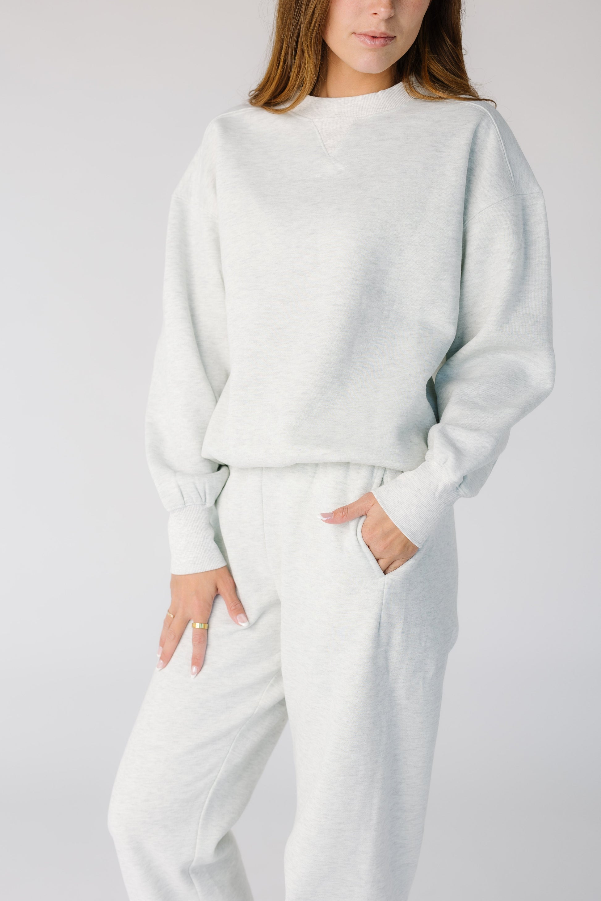 Close view of a woman in a light frey sweats
