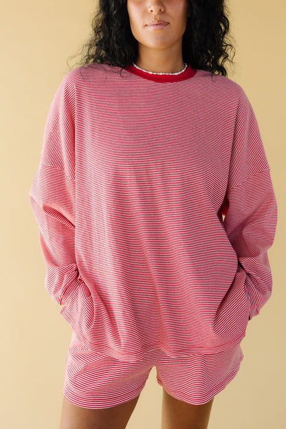 Woman wearing Poppy red & white stripe loose fitting top with Poppy stripe shorts.