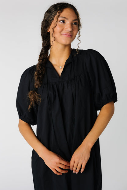 Modest woven black dress with full short sleeves