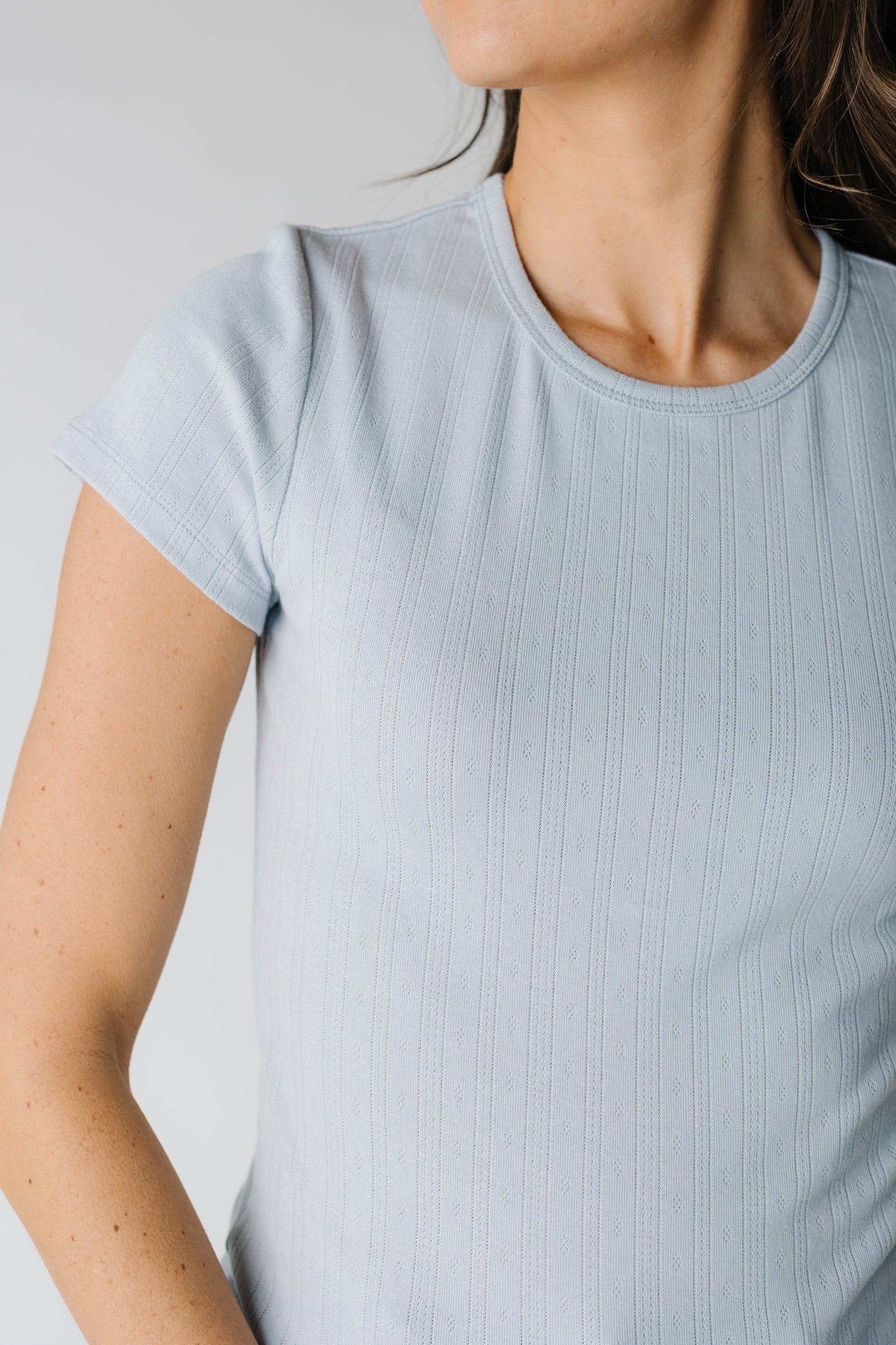 Close view of blue pointelle top