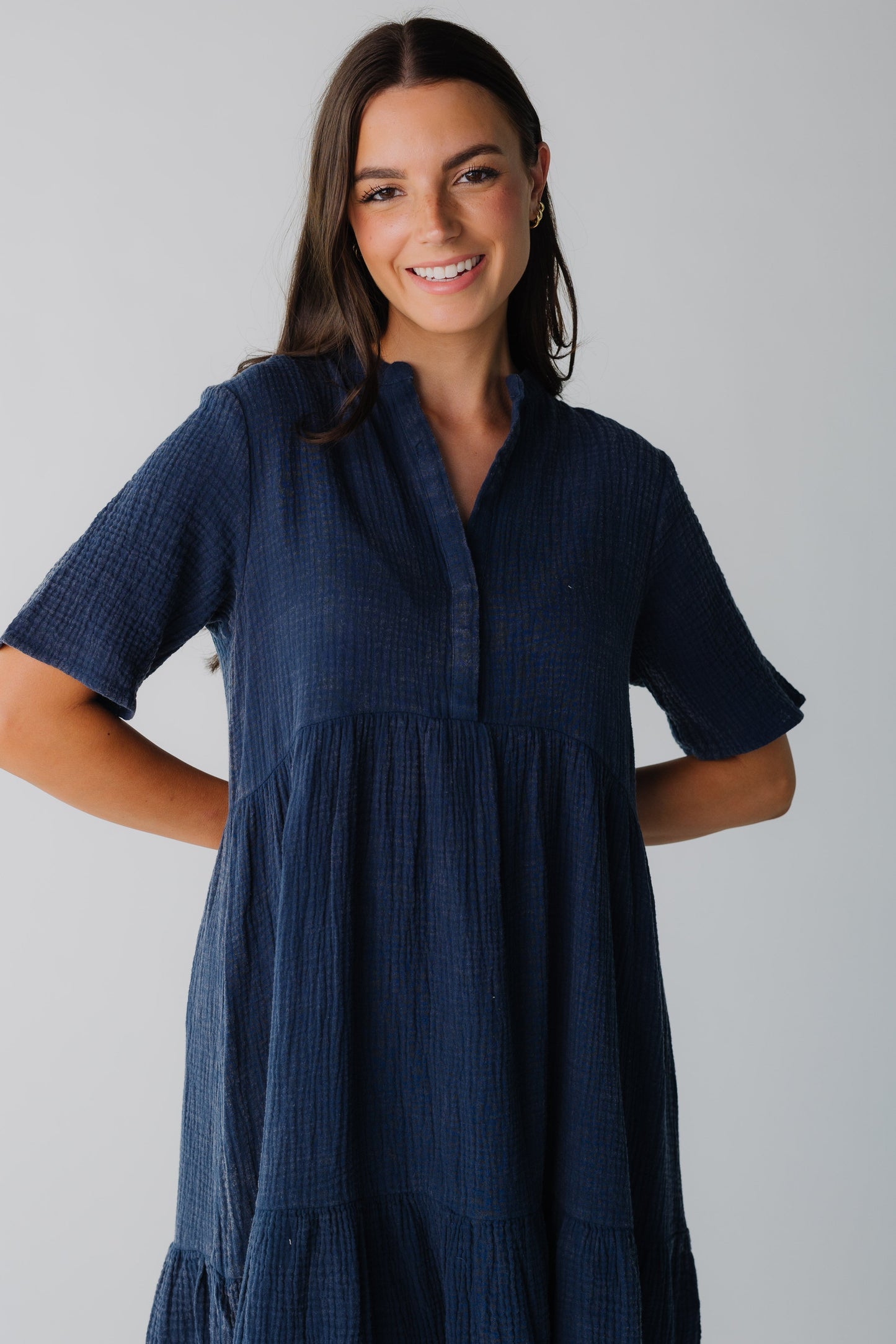 Modest women's dress with V-neckline and short sleeves in navy