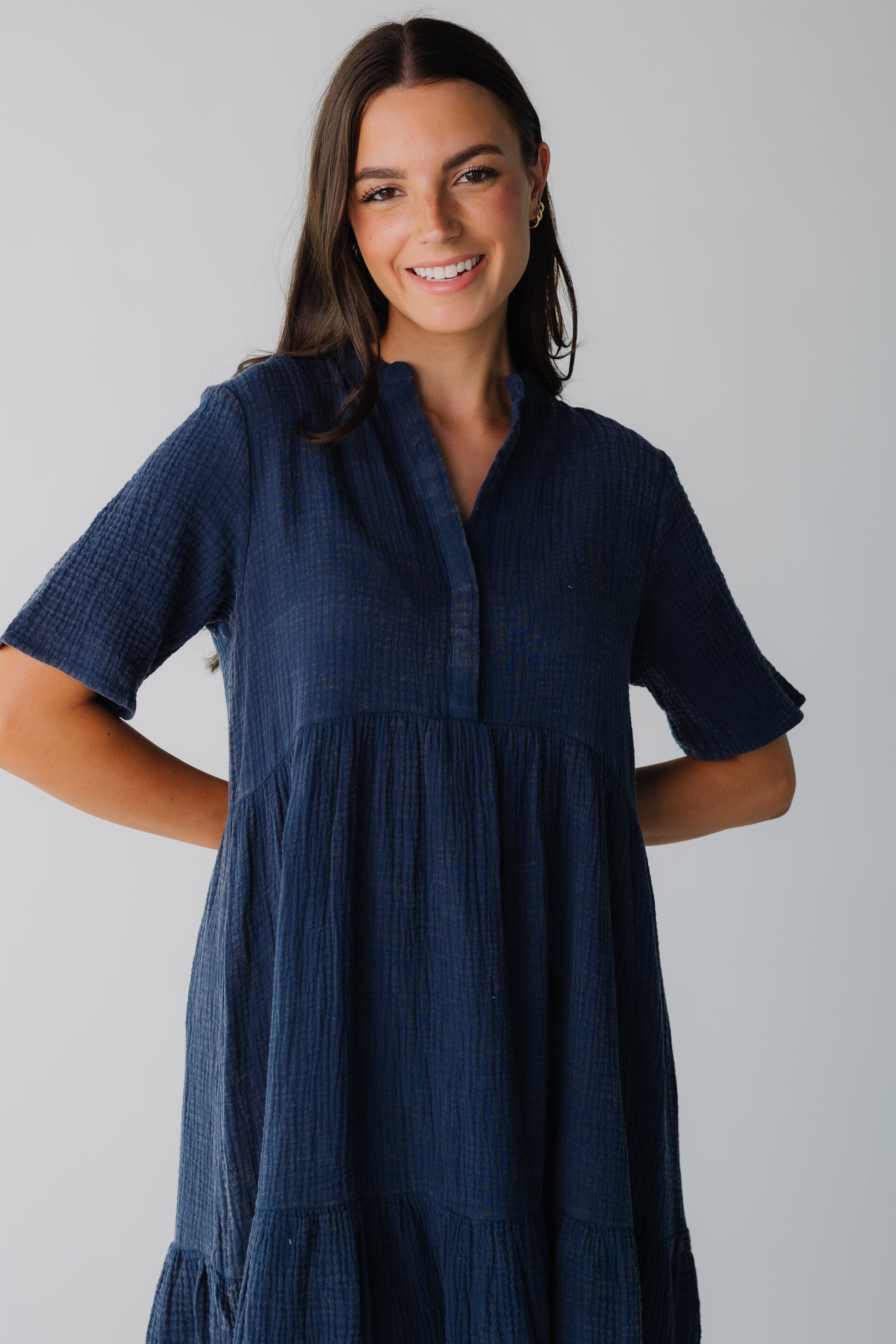 Modest women's dress with V-neckline and short sleeves in navy