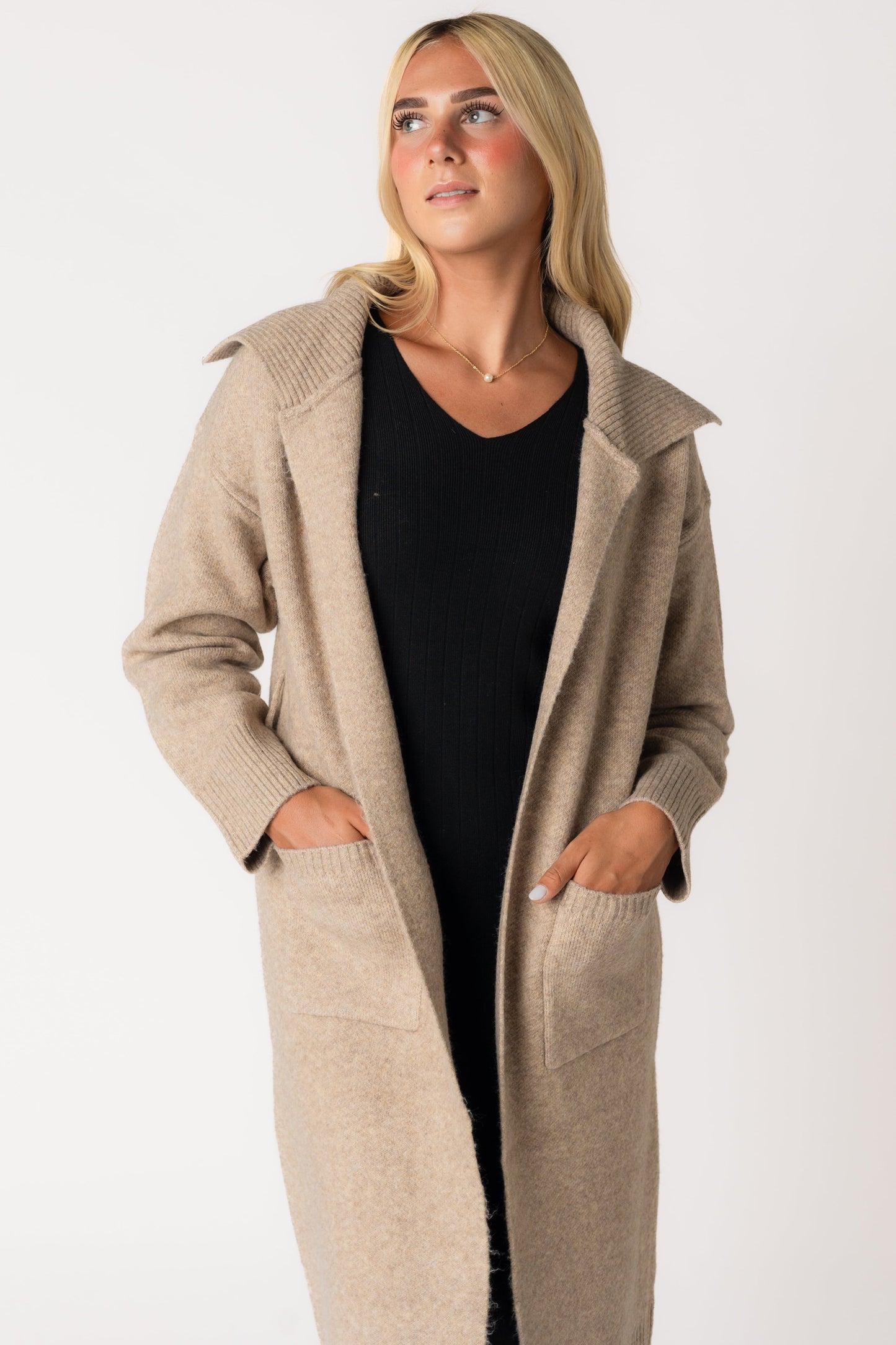 Wide ribbed modest sweater jacket with long sleeves and pockets