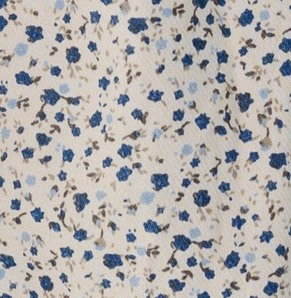 Cream & blue floral fabric swatch.