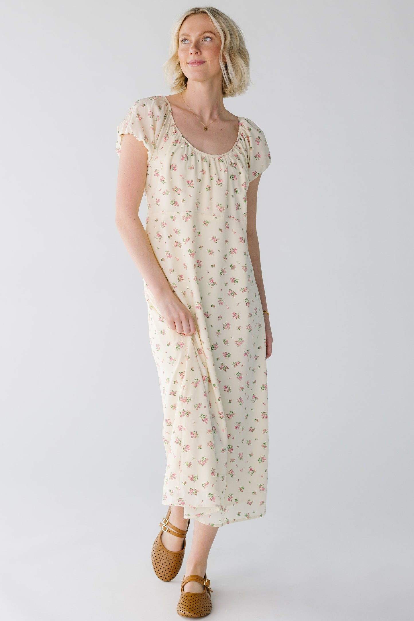 Modest cream floral midi with scoop neckline and short puff sleeves