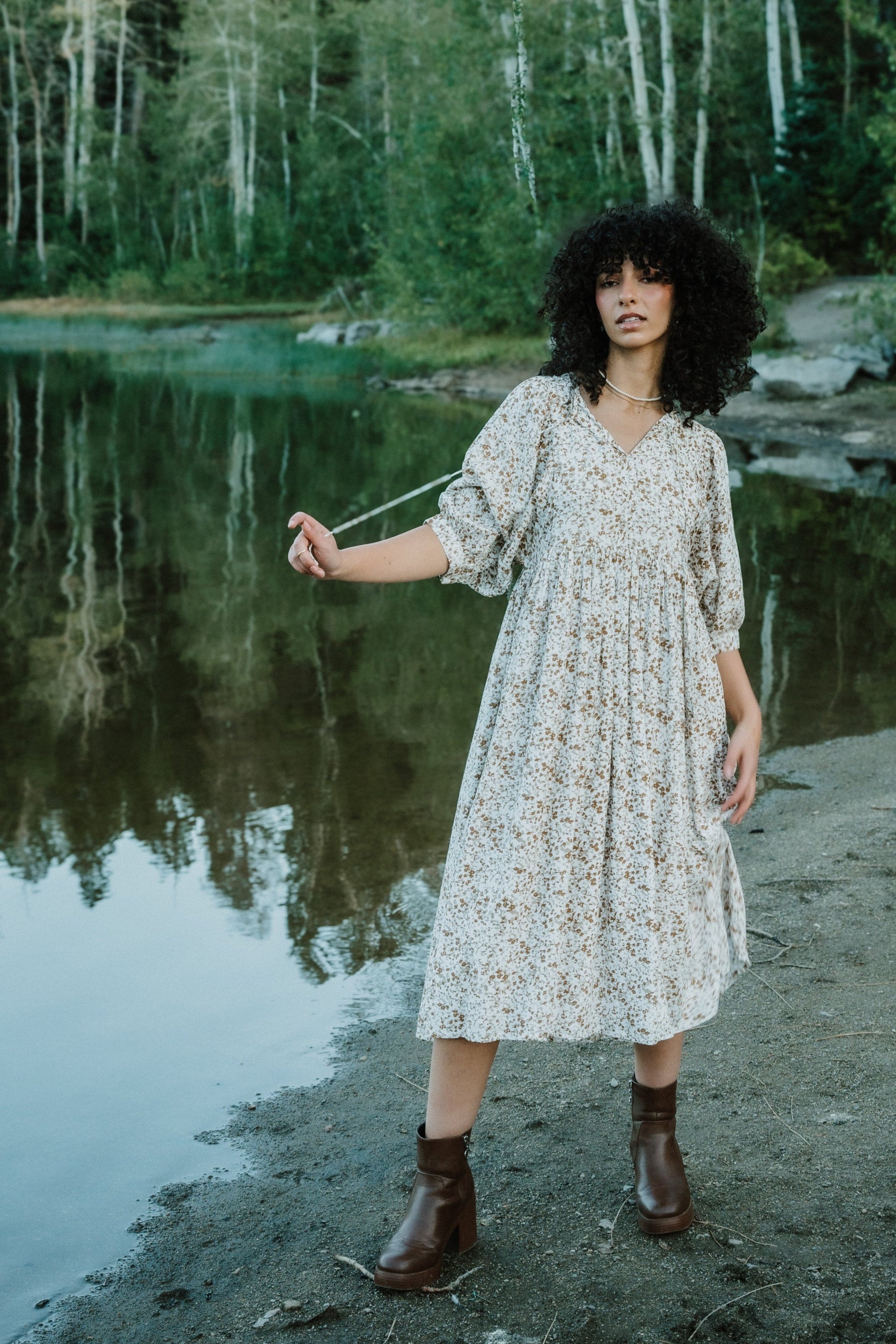 Ivory print midi dress with half length sleeves and V-neckline