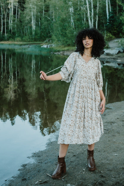 Ivory print midi dress with half length sleeves and V-neckline