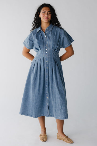 Modest denim midi with snug pleated waist