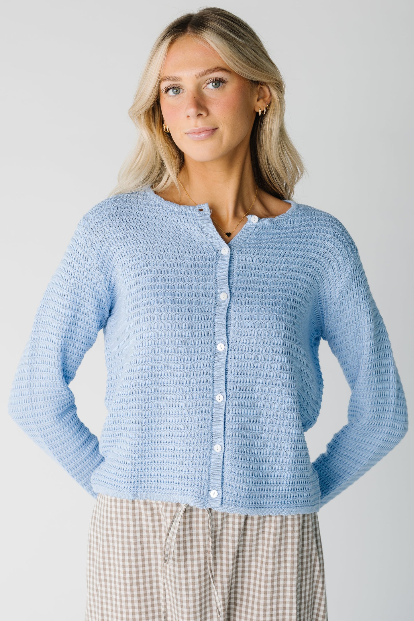 Modest light blue cardigan with crew neckline and long sleeves