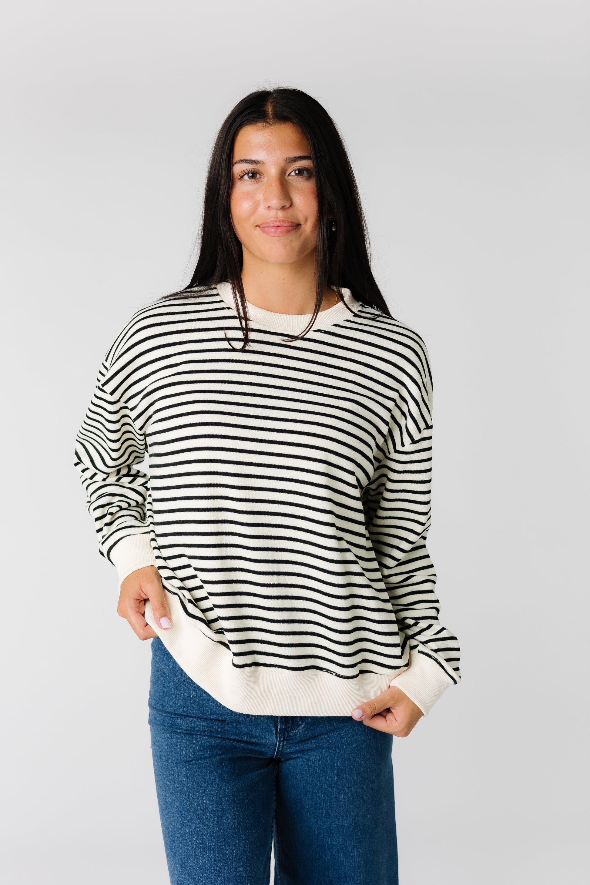 Modest cream crewneck sweater with black stripes