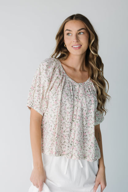 Modest floral print button down top with scoop neckline with short puff sleeves