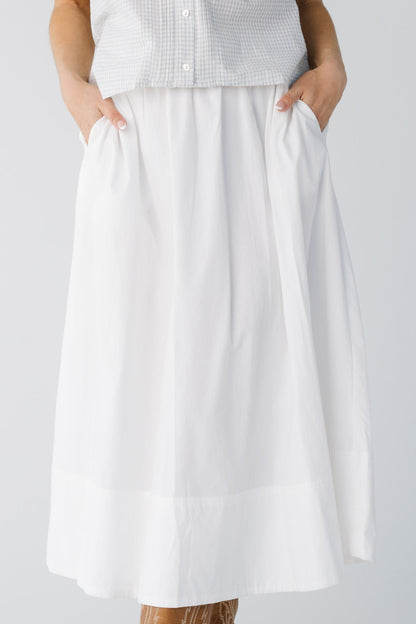Close view of white woven pocket skirt