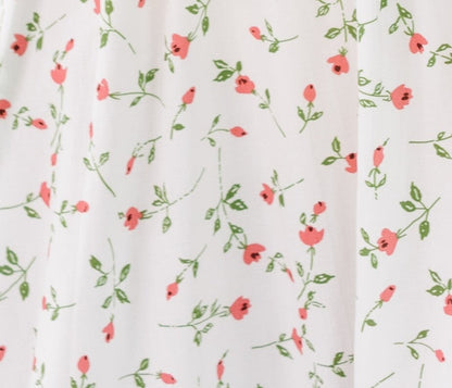 Ivory with red floral print fabric swatch.