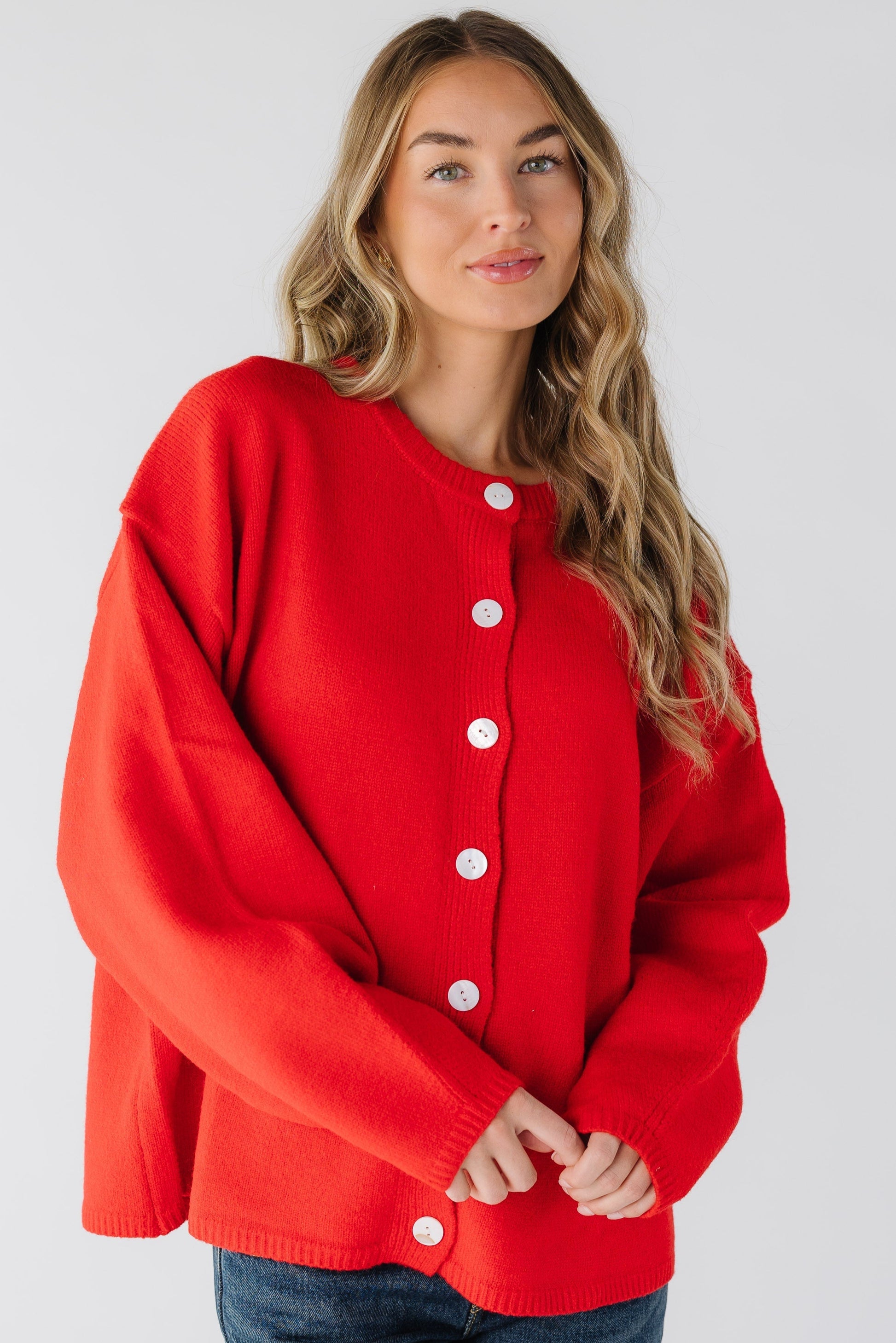 Modest women's red cardigan with long sleeves