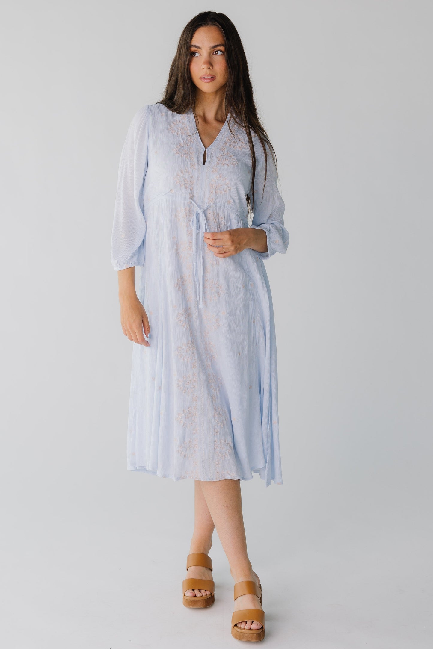 Modest light blue midi dress with long sleeves and V-neckline 