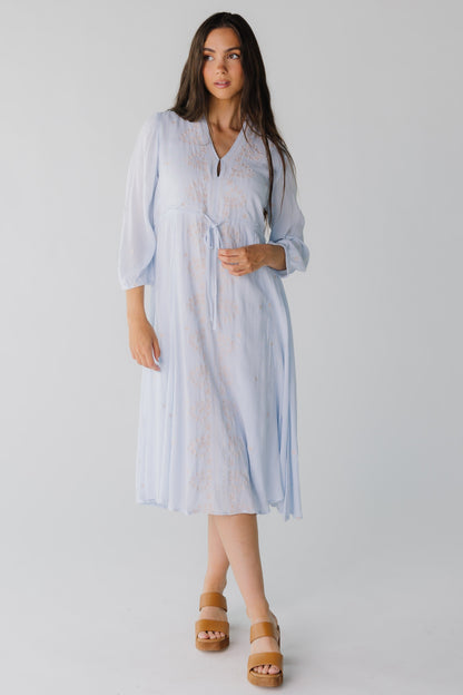 Modest light blue midi dress with long sleeves and V-neckline 
