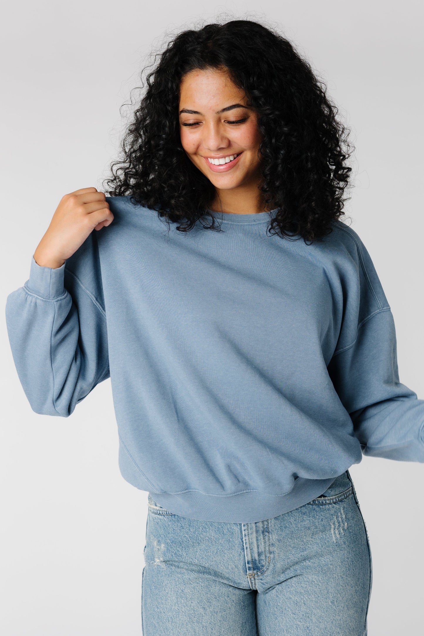 Blue long sleeve sweatshirt with crew neckline