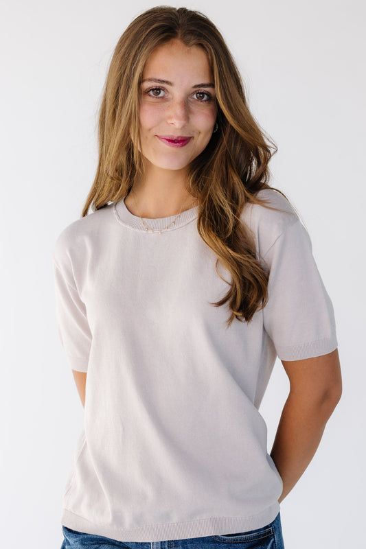 The Lightweight Crew Neck Sweater in light grey for women and teens.