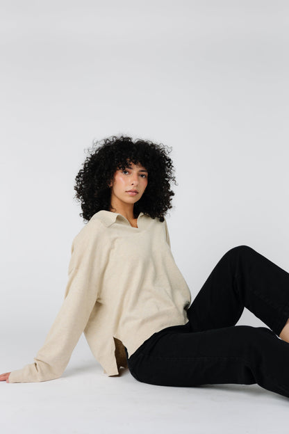 Oatmeal color sweater with v-neckline and collar