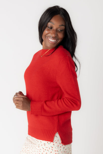 Red long sleeve sweater with crew neckline