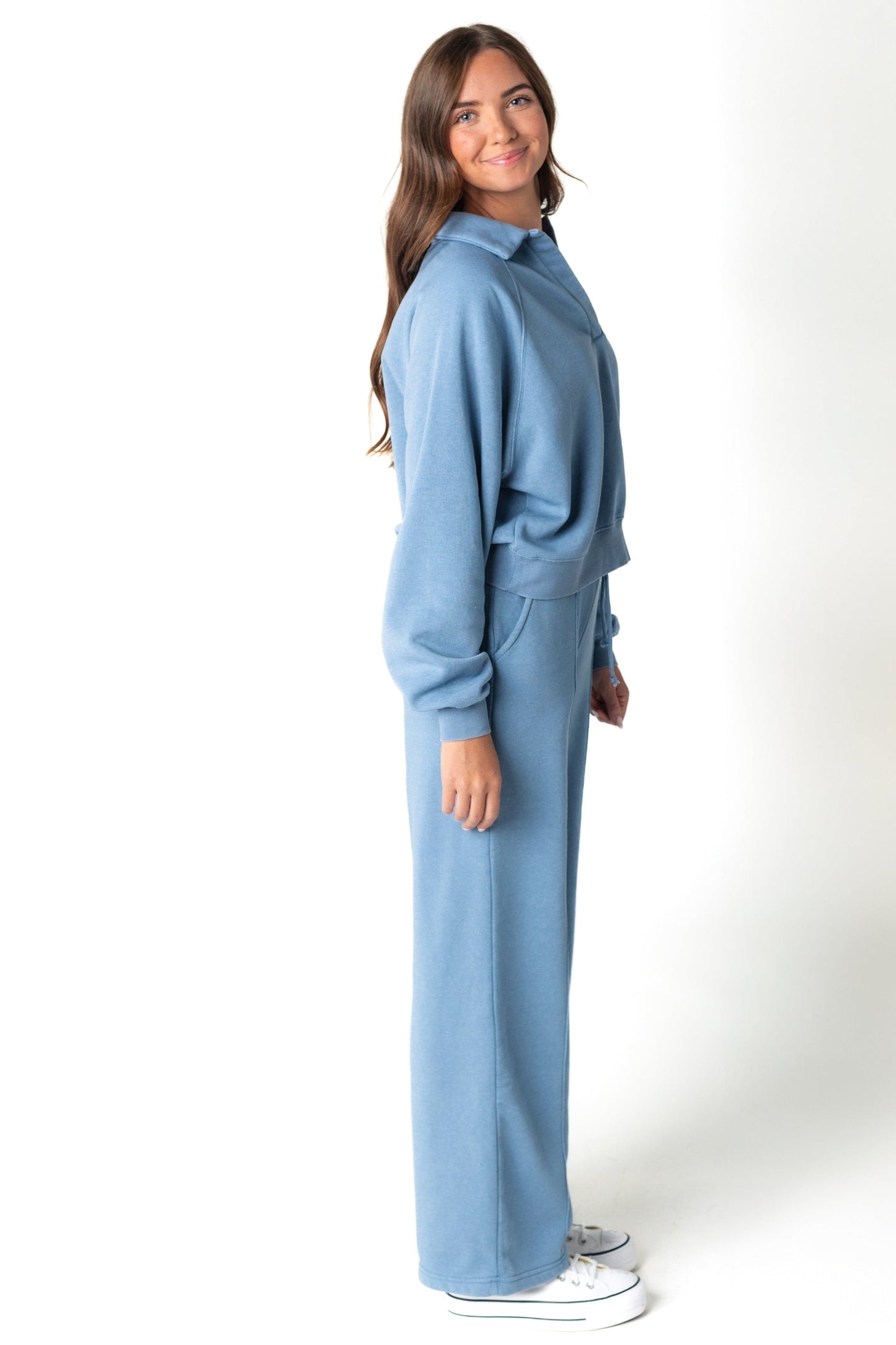 Side view of long sleeve knit set in light blue