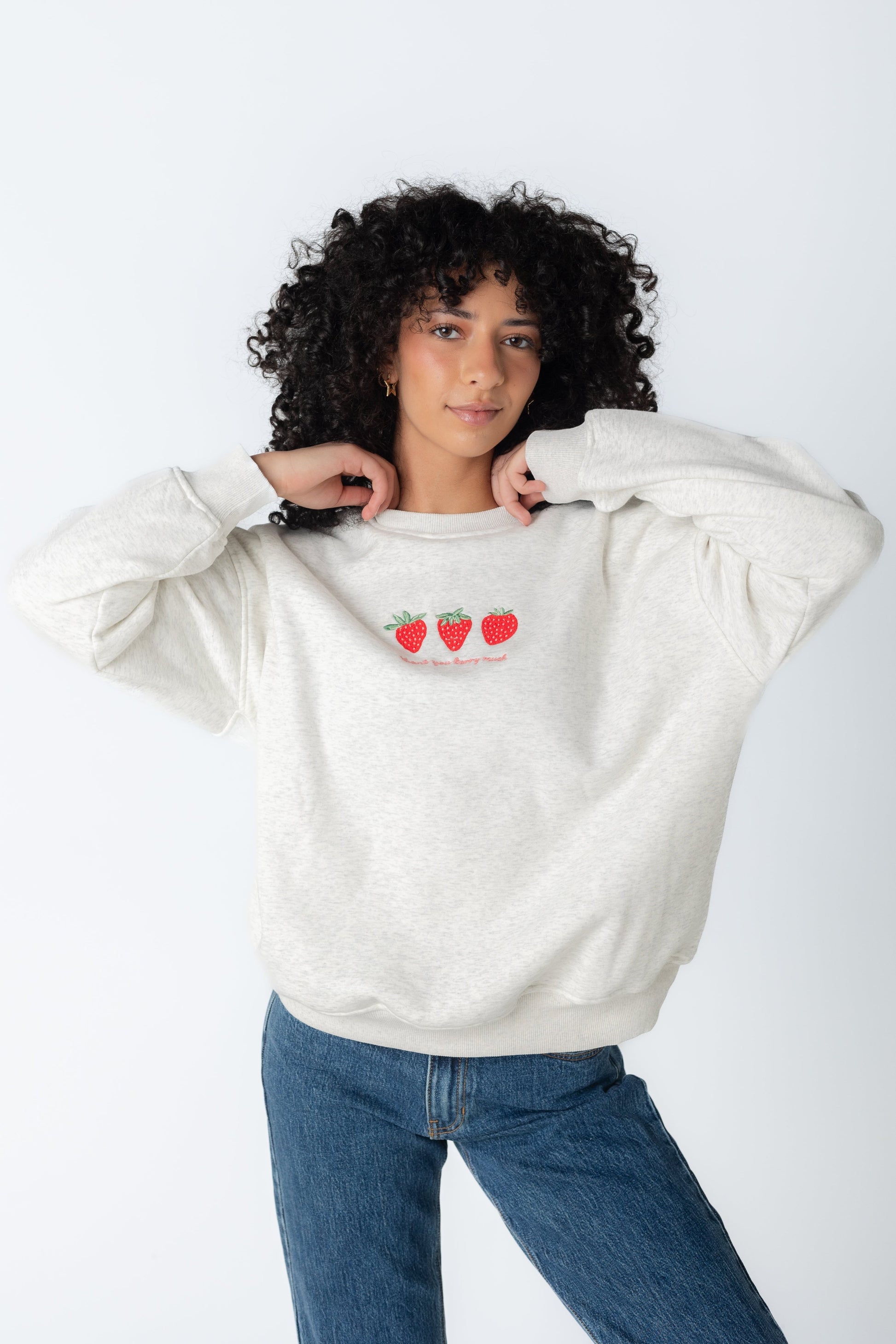 White crewneck sweatshirt with strawberry graphic